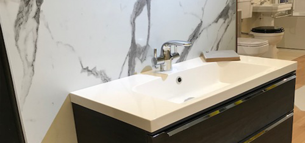 Quality Bathrooms & Kitchens displaying Nuance Calacatta Statuario. 